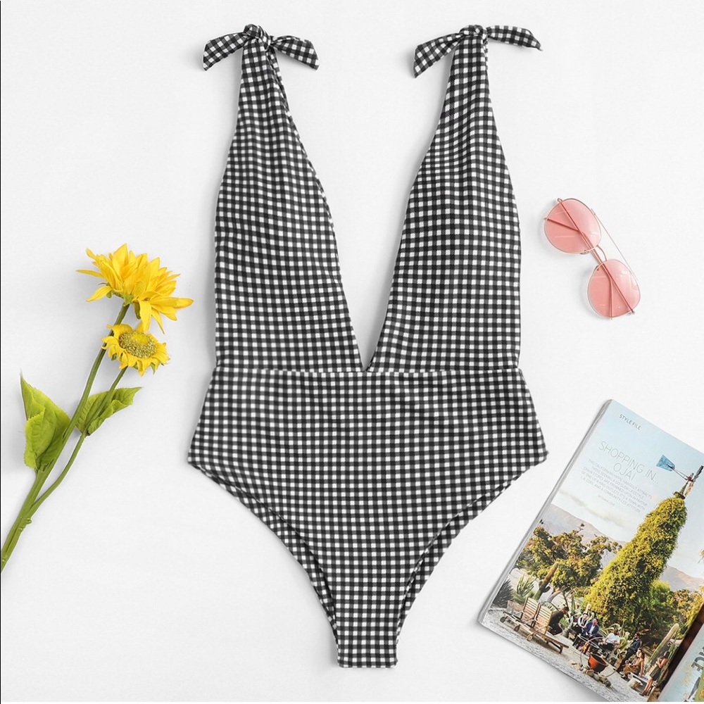 Brand new still in packaging one piece swimsuit